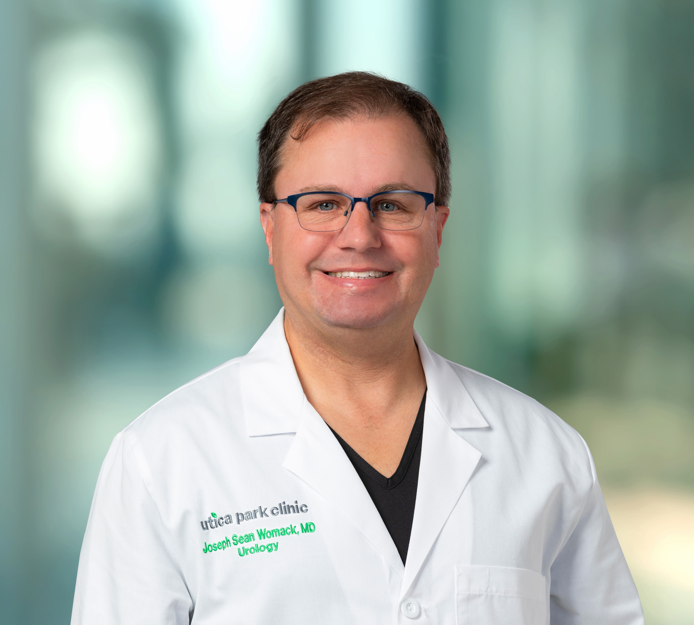 Joseph Womack, M.D.